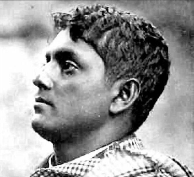 Profile photograph of Jatindranath Mukherjee looking upward, wearing a checked wrap over one shoulder.